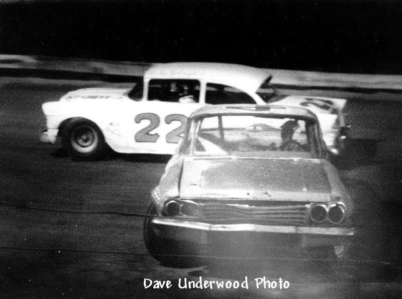 Lee Roy Yarbrough zooms past spinning car at Columbia
