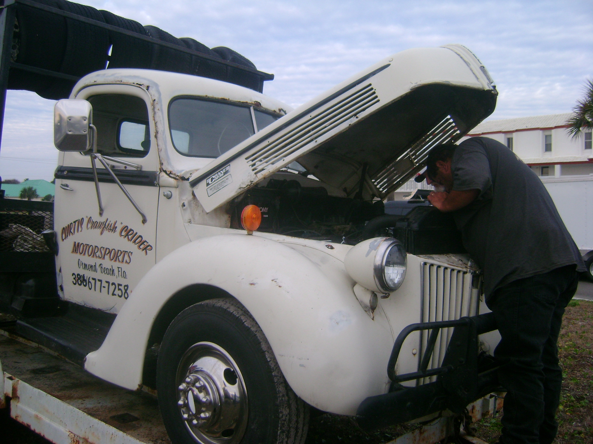 Dean working on Curtis Crawfish Crider’s old Flatbed that he use to own