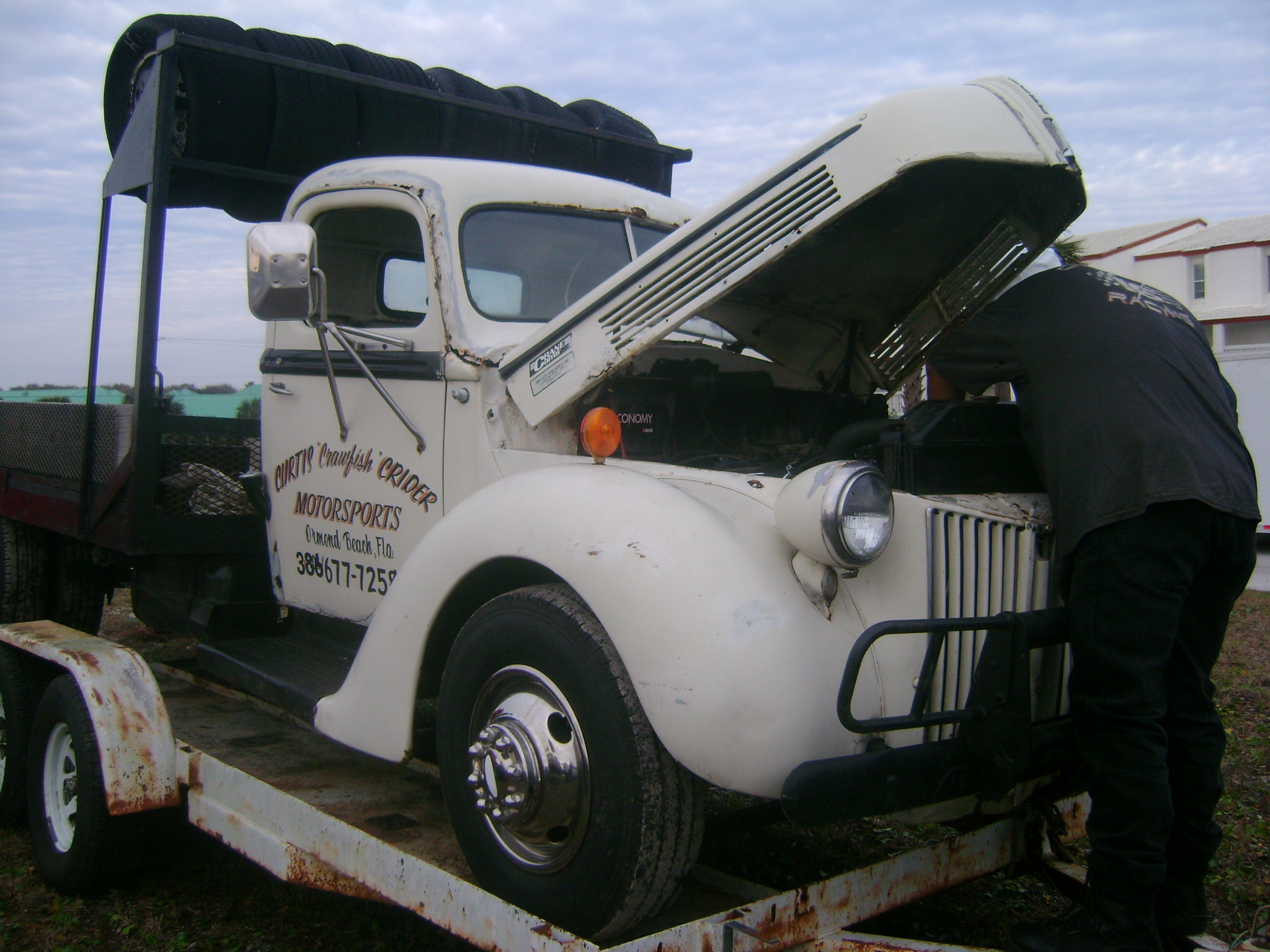 Dean working on Curtis Crawfish Crider’s old Flatbed that he use to own