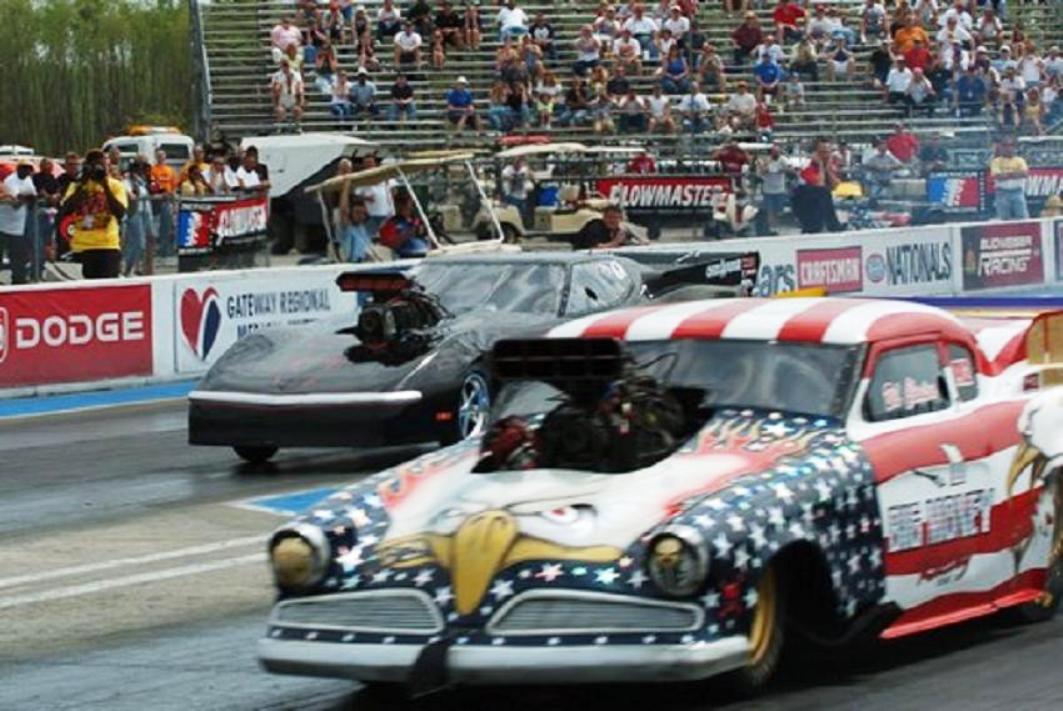 Bil Clanton rolls on while Bill Kuhlmann trys to keep his vette in one piece…