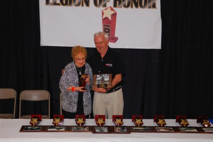 Helen Gibb Receiving Fred Gibb Legion of Honor ’08