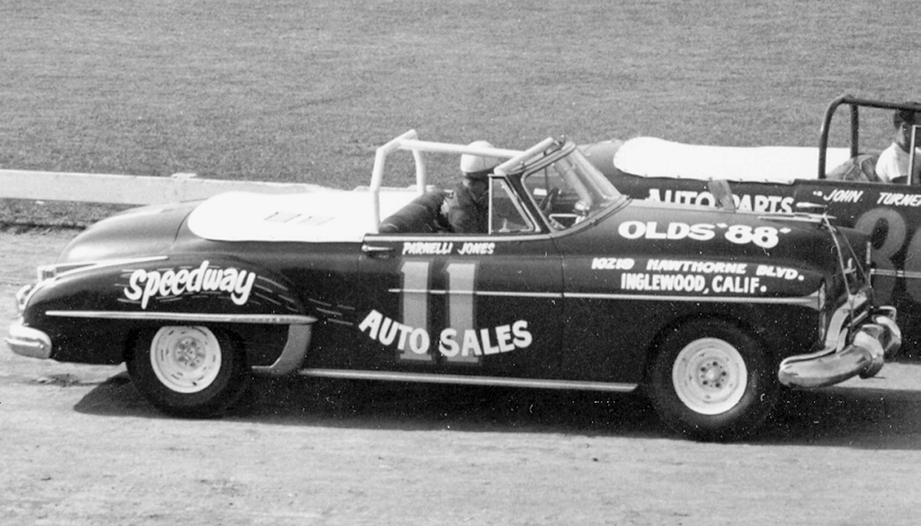 Parnelli Jones, in one of his first stock cars, a 1950 Olds convertible.
