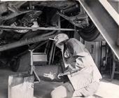 Billy Ross looking over his racecar late 60’s